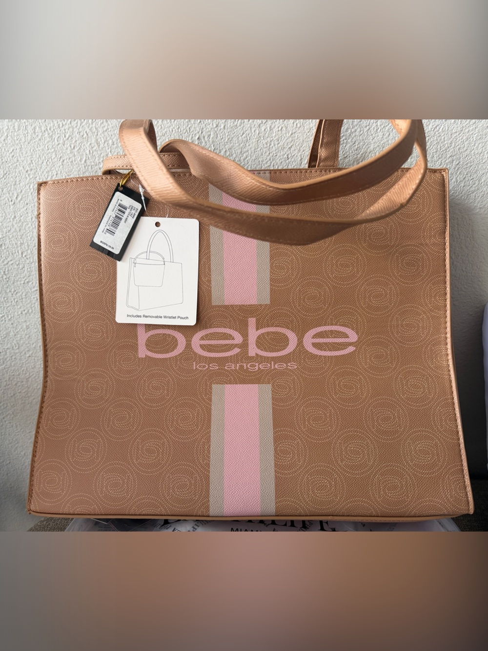 bebe Metallic Rose Gold Tote with Pink Stripe